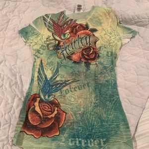 Harley Davidson woman’s t-shirt size large but fits more like medium